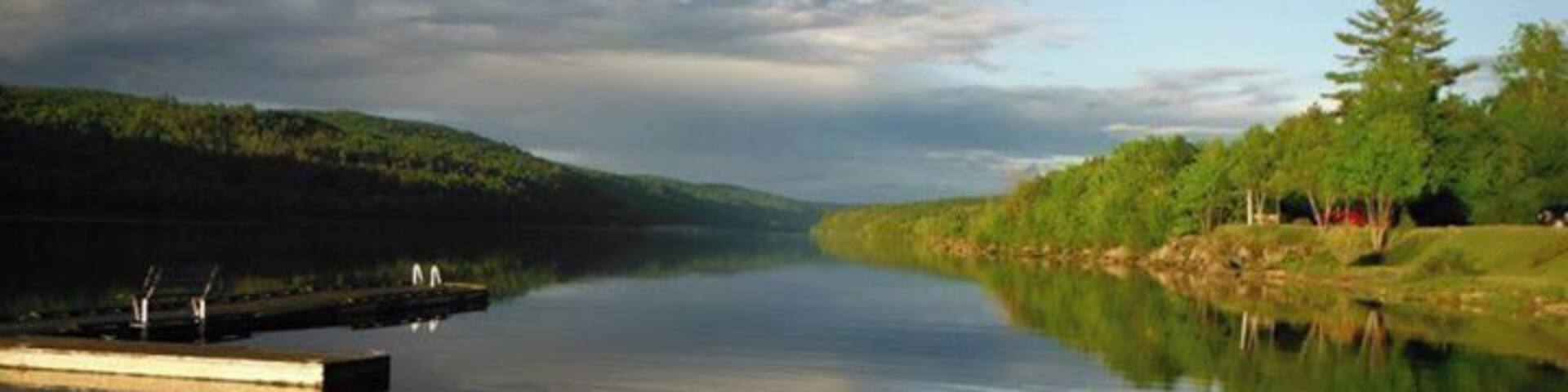 A view facing the opposite direction along the Ottawa River in Mattawa, Ontario. This picture was taken just down the hill from Valois' Motel & Restaurant. It's the perfect pitstop on a #roadtrip from Sudbury to Ottawa!