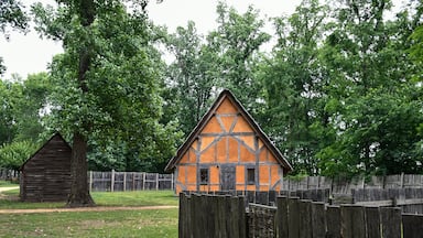 Orange house with wooden fence, Early Settlement Interpretive, Henricus Historical Park, Chester, Virginia