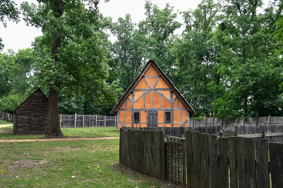 Orange house with wooden fence, Early Settlement Interpretive, Henricus Historical Park, Chester, Virginia