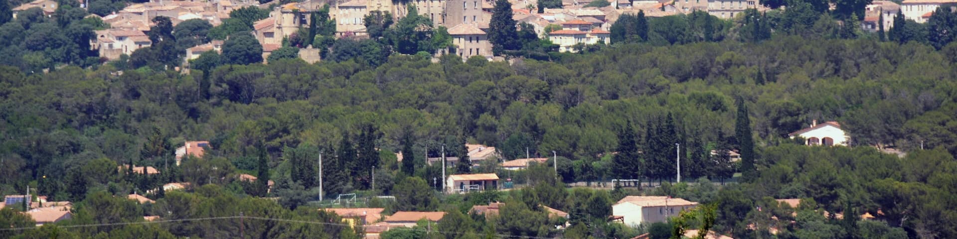 The pittoresque village Aubais at the other side of the Vidourle river at the hill at 18 June 2015