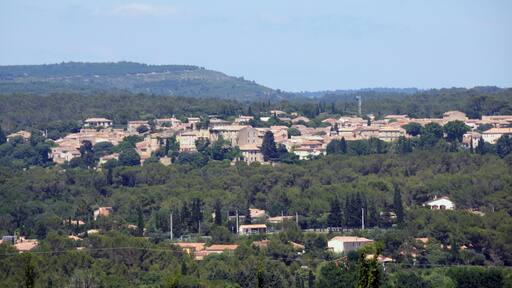 The pittoresque village Aubais at the other side of the Vidourle river at the hill at 18 June 2015