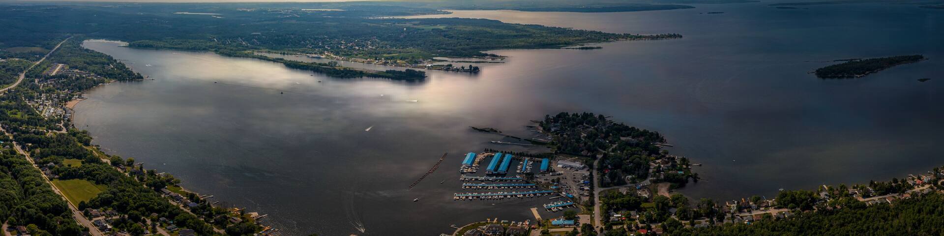 Victoria Harbour drone view no then lights shining on simco lake