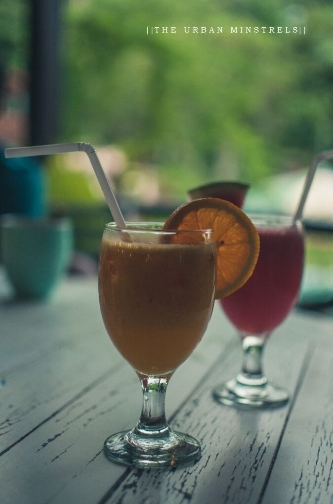 There's something special about breakfasts with a view. And if the breakfast consists of freshly pressed fruit juices and smoothies, the fun simply doubles!!

This photograph had been taken while we were having our breakfast at a restaurant overlooking the Desa Dairy Farm in Kundasang. Know more about the place and all other details from the latest article in our blog:
https://theurbanminstrels.wordpress.com/2017/04/11/planning-a-trip-to-kundasang-heres-everything-you-need-to-know/ 