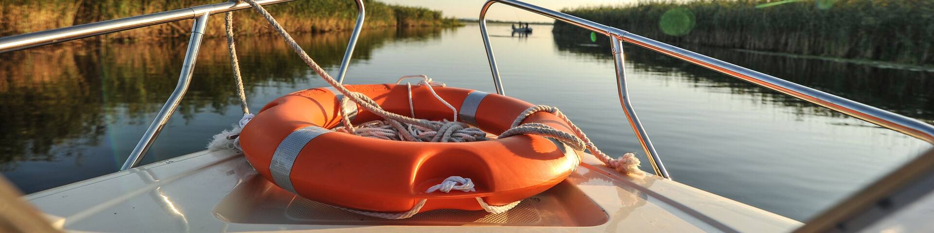sunset in the Danube delta Romania.Beautiful blueish lights in water.Beautiful sunset landscape from the Danube Delta Biosphere Reserve in Romania