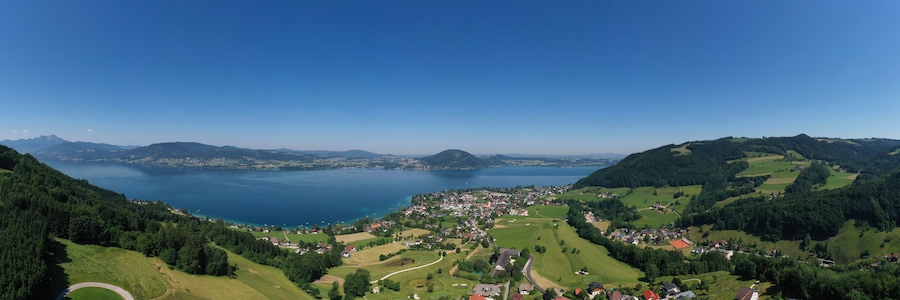 Austria, Upper Austria, Weyregg am Attersee, Drone panorama of small town on shore of Lake Atter