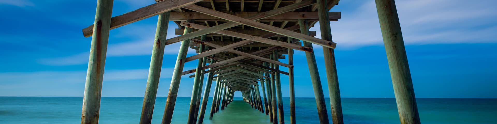 A long exposure beneath the Bogue Inlet Fishing Pier in Emerald Isle, North Carolina
