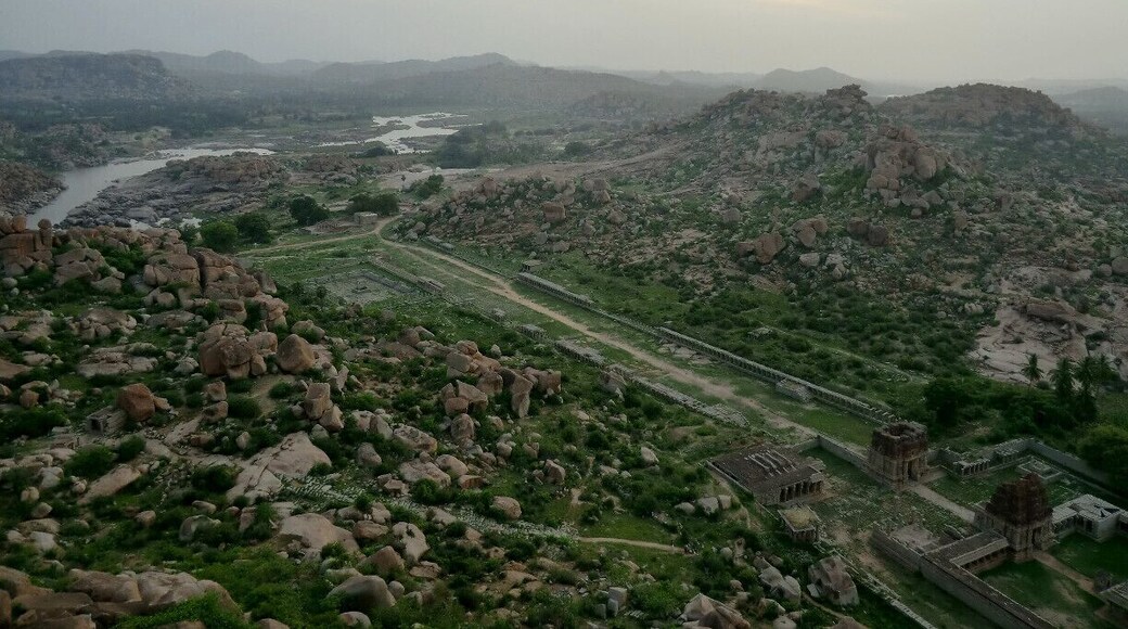 The view over Hampi at sunrise is totally worth the climb (about 15-20min).
Hampi is a very peaceful place, we went there off season (late spring) and stayed for a few days to unwind. We rented bicycles to wander around the valley and its beautiful temples. Paths are well signed and easy to follow, but remember to carry some water.
#bicycle