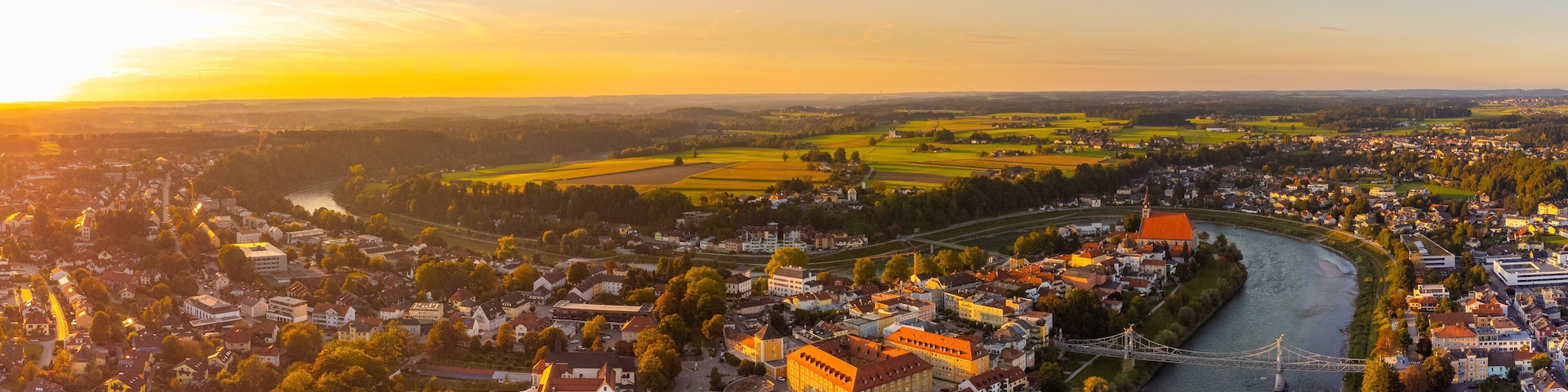 City of Laufen, Bavaria, and Oberndorf bei Salzburg, Austria, in summer at sunset