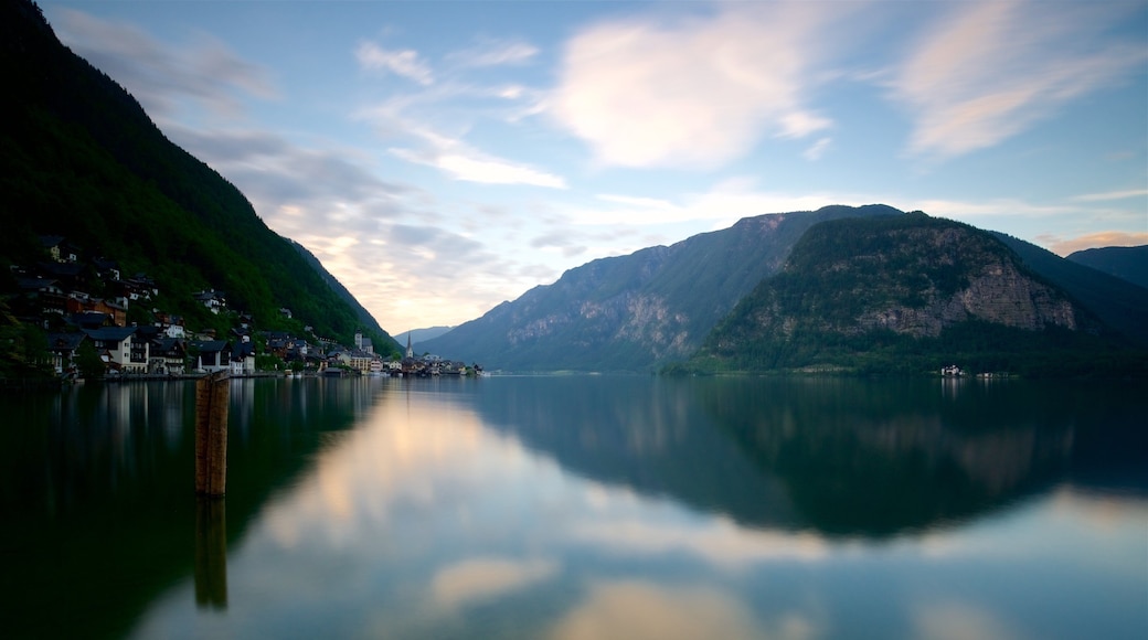 Hallstatt which includes a sunset and a lake or waterhole