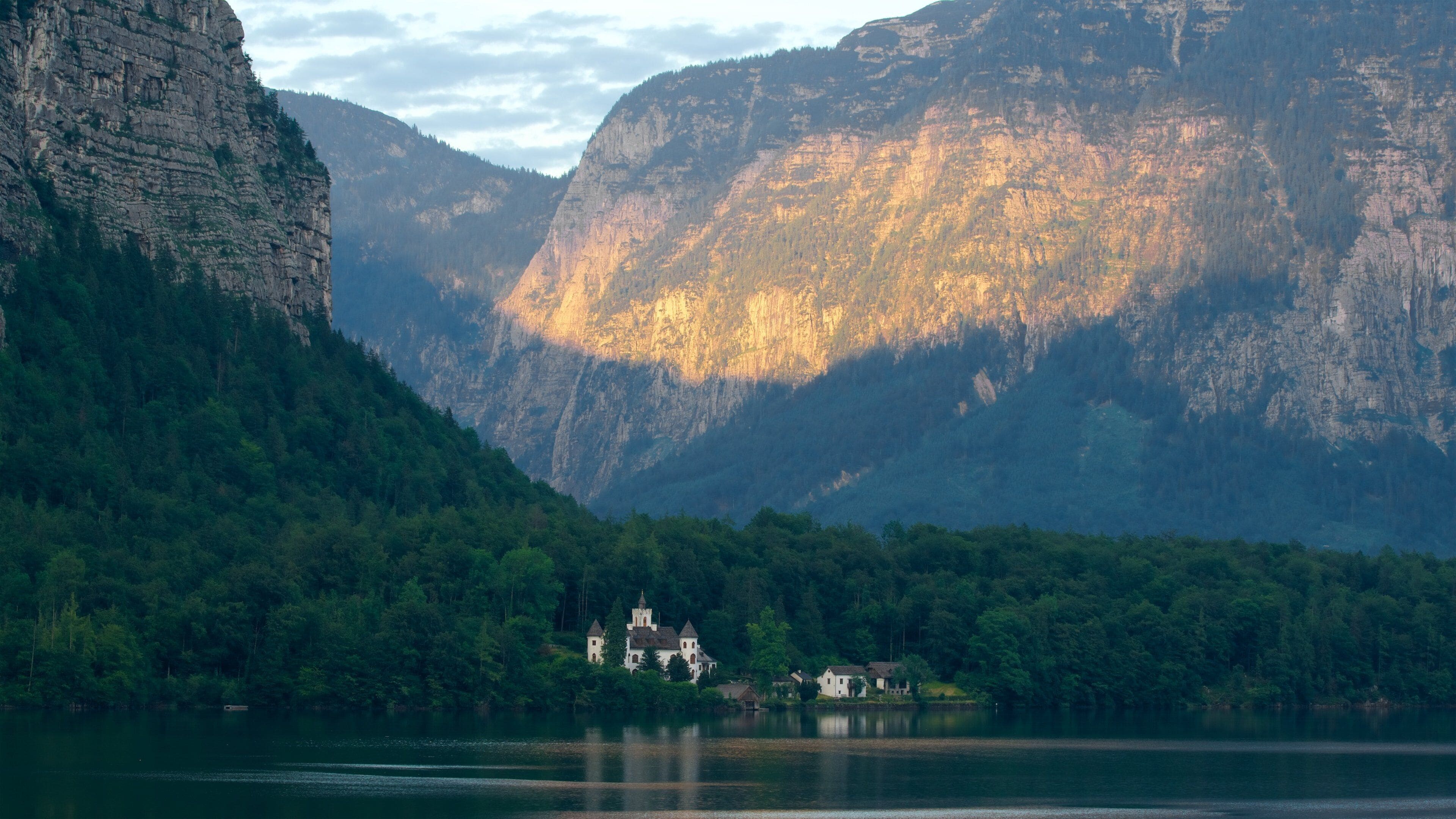 Hallstatt Lake featuring mountains and a lake or waterhole