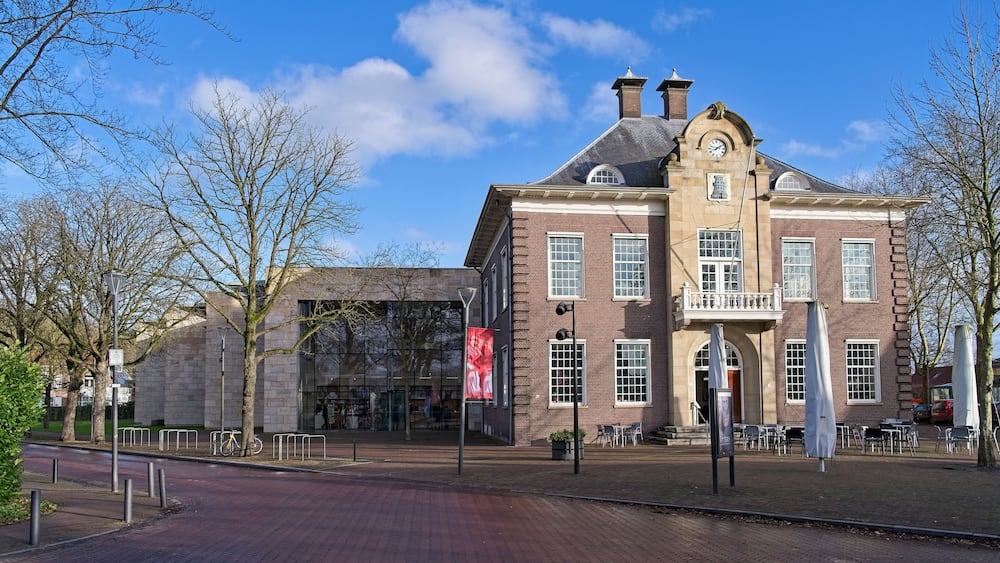 Former town hall of Gorssel with an empty terrace in front of it.