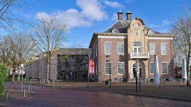 Former town hall of Gorssel with an empty terrace in front of it.