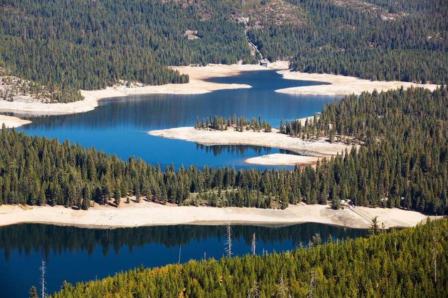 The ice house lake in drought conditions in the El Dorado National Forest, California, USA.