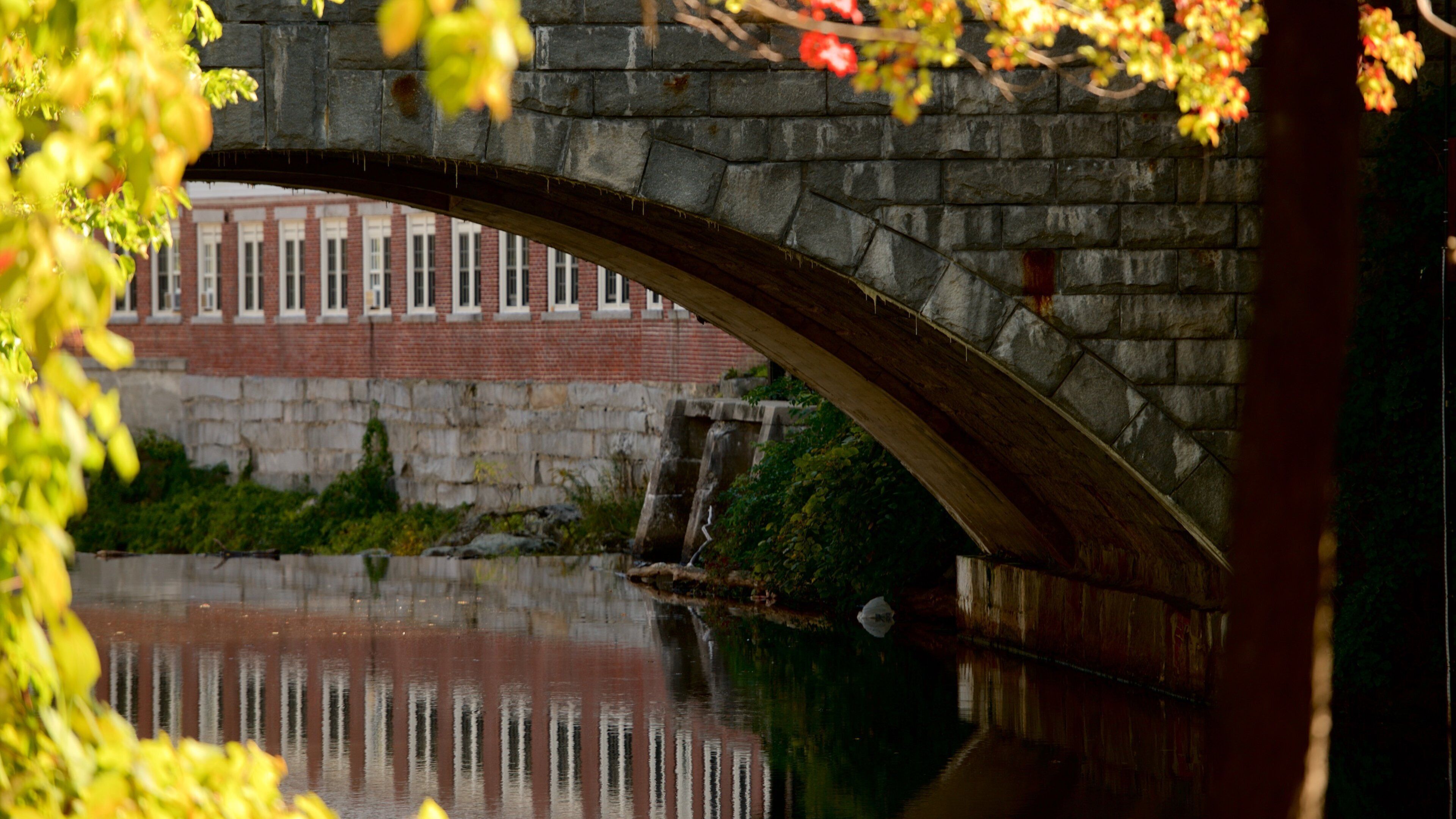 Milford featuring a river or creek and a bridge