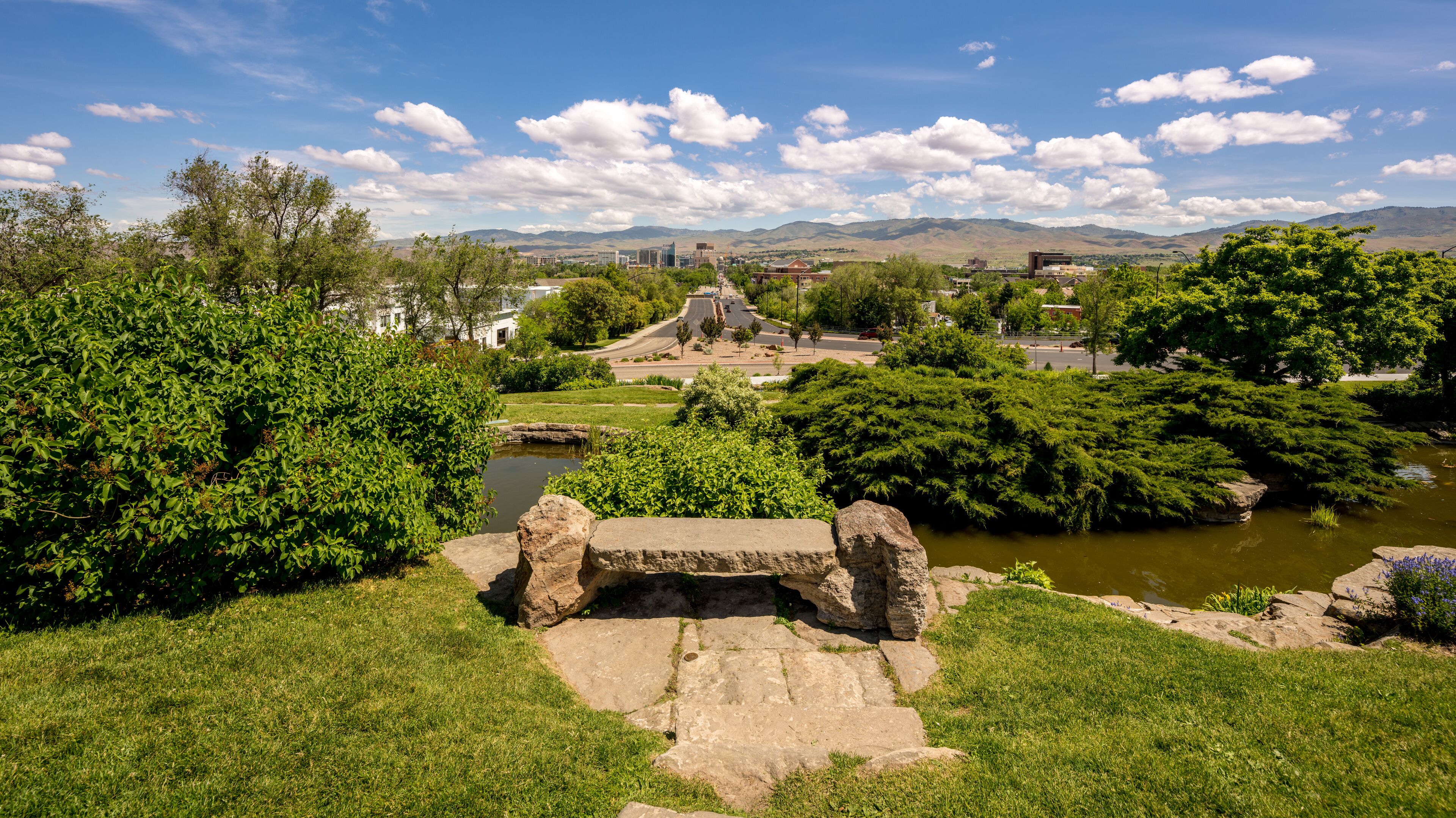 Park bench and the distant skyline of Boise Idaho