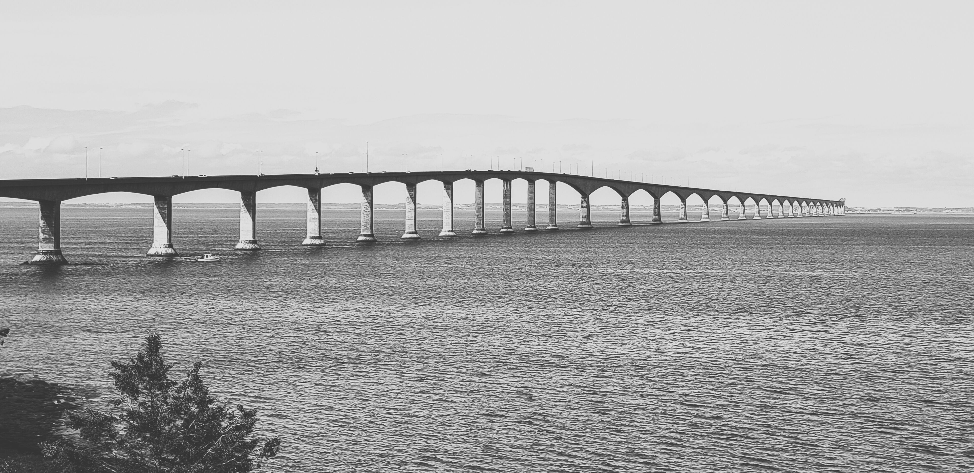 Confederation Bridge connects the mainland to Prince Edward Island. While it's free to drive across to the island, the return trip will cost you approx. $50 for a car and more if you are driving a larger vehicle. It's length totals 12.9 KM making it the world's largest bridge over ice covered water.