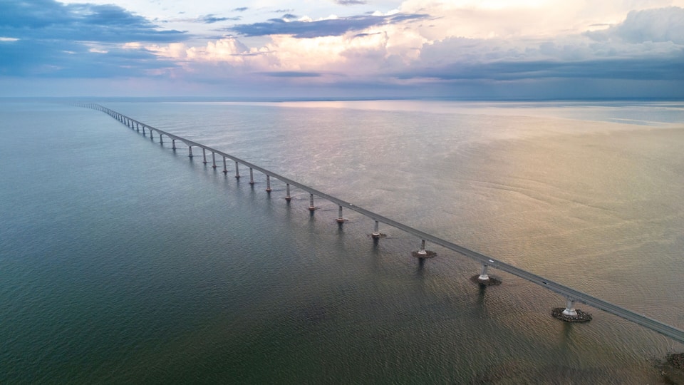 Confederation Bridge (French: Pont de la Confédération) is a box girder bridge carrying the Trans-Canada Highway across the Abegweit Passage of the Northumberland Strait, aerial view