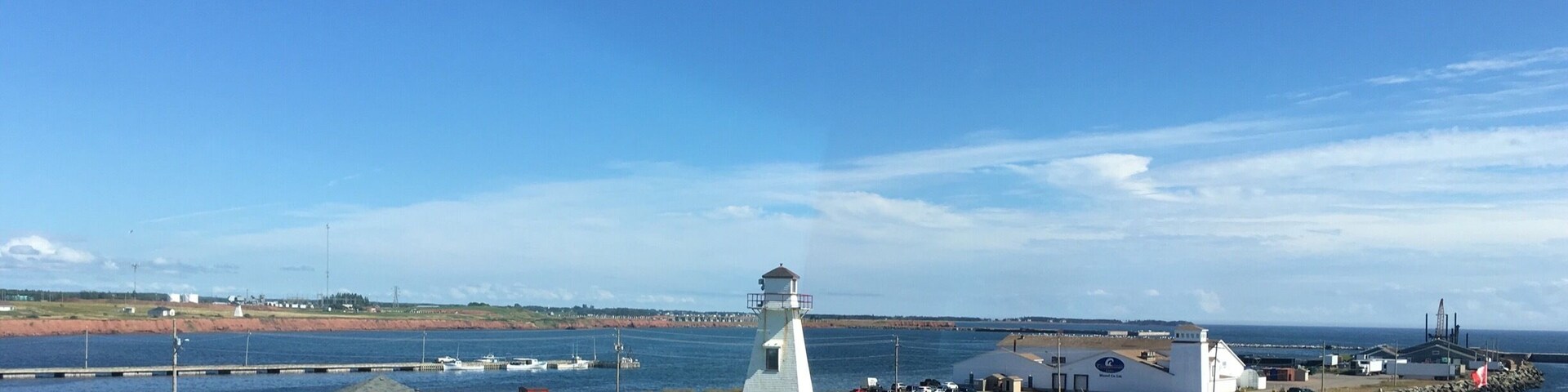 Lighthouse seen when arriving on PEI shore from Confederation Bridge. Sorry about the reflection. This was taken from the side window of motorhome...