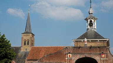 city gate called Kaaipoort in Aardenburg, The Netherlands. With towers. Blue sky, space for text