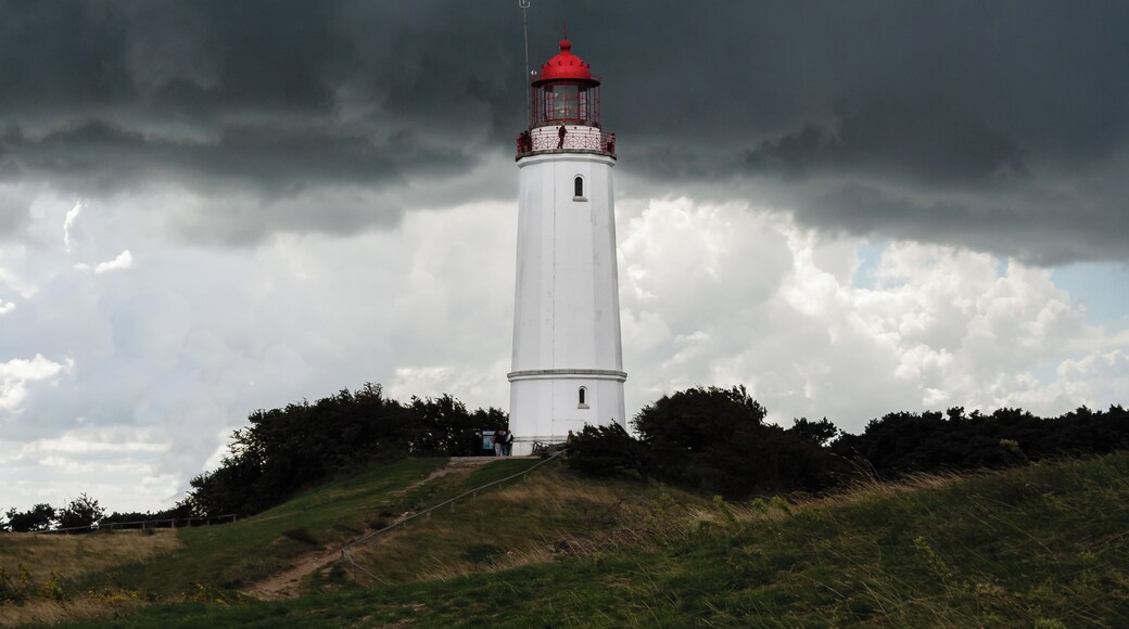 Designation: Dornbusch Lighthouse Location: Am Leuchtturm House number: 1 Place: Urban district Kloster, Municipalitiy Insel Hiddensee, Country subdivision West-Rügen,District Vorpommern-Rügen, Mecklenburg-Vorpommern, Germany Construction time: 1887–1888 Description: Stormy atmosphere at the Dornbusch Lighthouse (Dornbusch/Hiddensee Beacon)