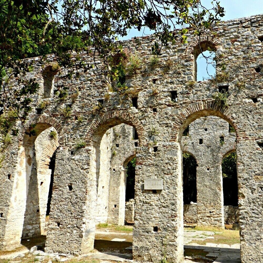 The Basilica at the UNESCO World Heritage site of Butrint in Albania. If you love ruins, especially ruins that you can visit while walking through lush forest then this is the site for you. 

