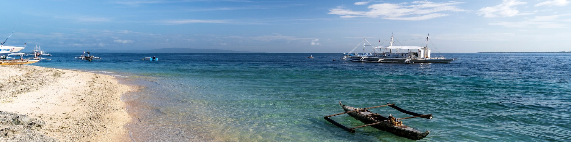 liloan beach on cebu, philippines. blue nice water for swimming relaxing snorkeling