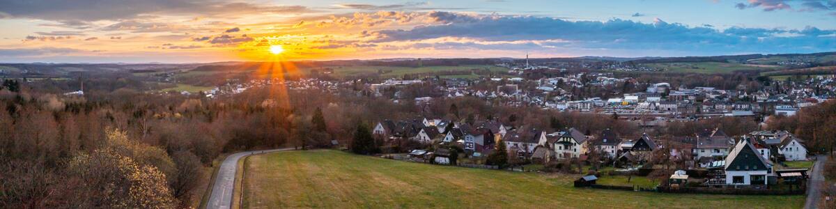Sunset, Aerial view over forests and meadows of Westerwald, Altenkirchen, Germany