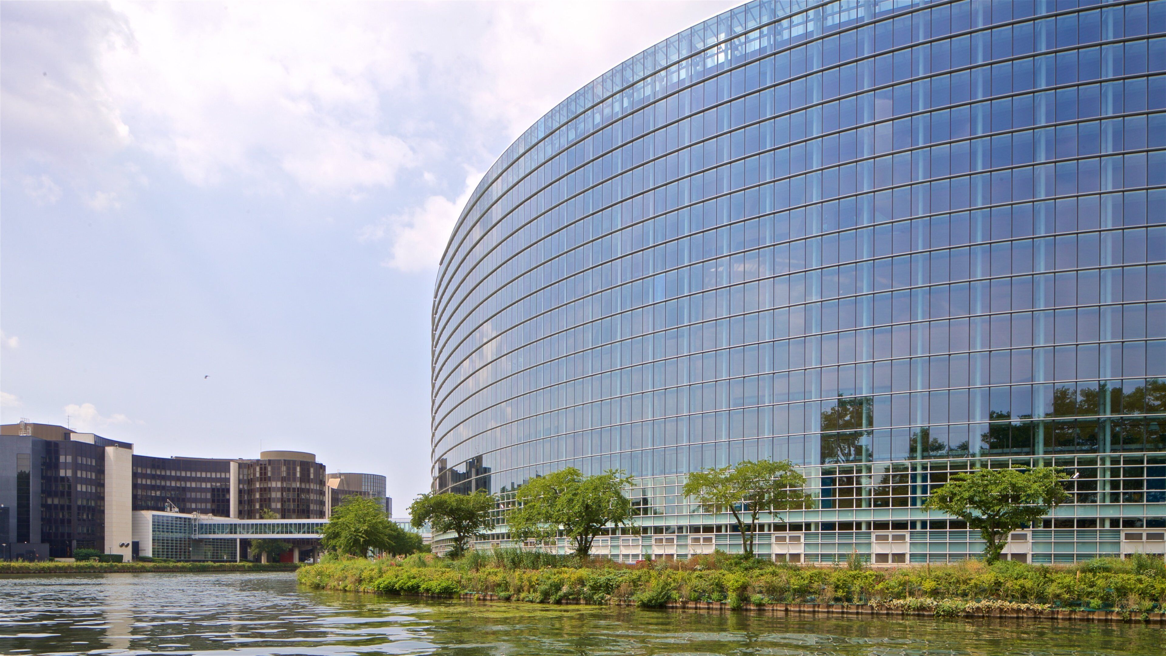 Contades which includes a river or creek and modern architecture