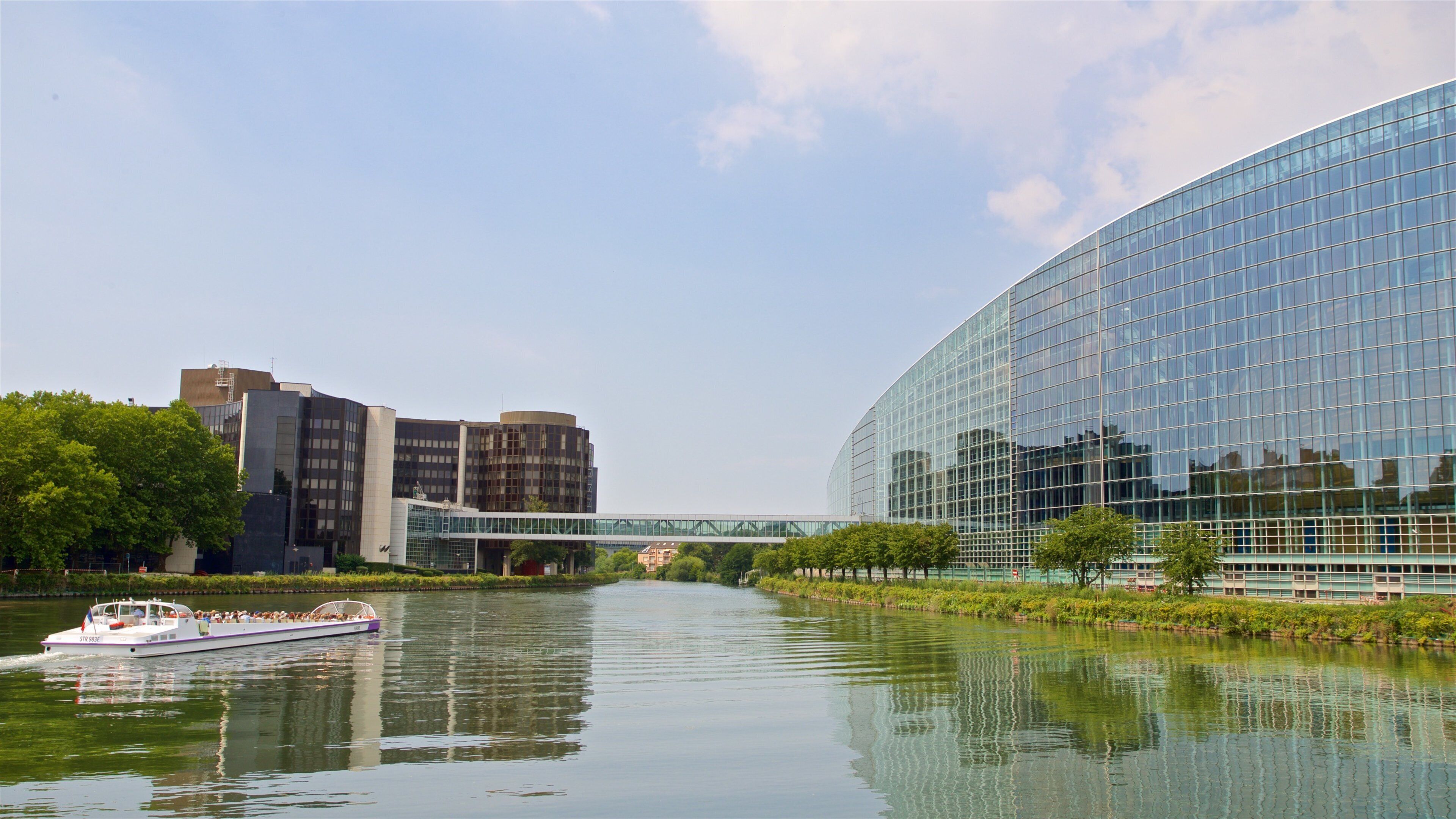 Contades which includes boating, modern architecture and a river or creek