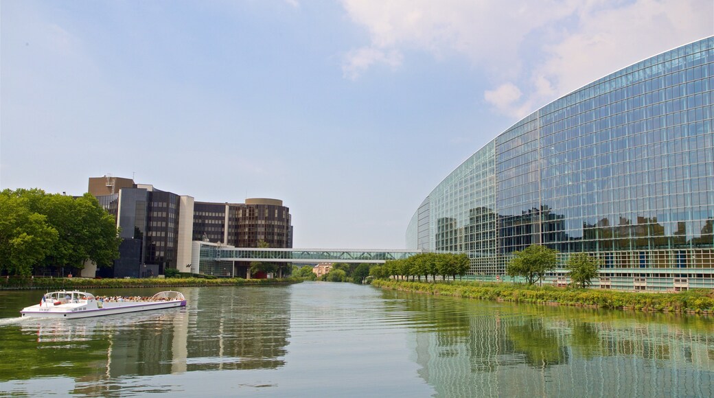 Contades which includes boating, modern architecture and a river or creek