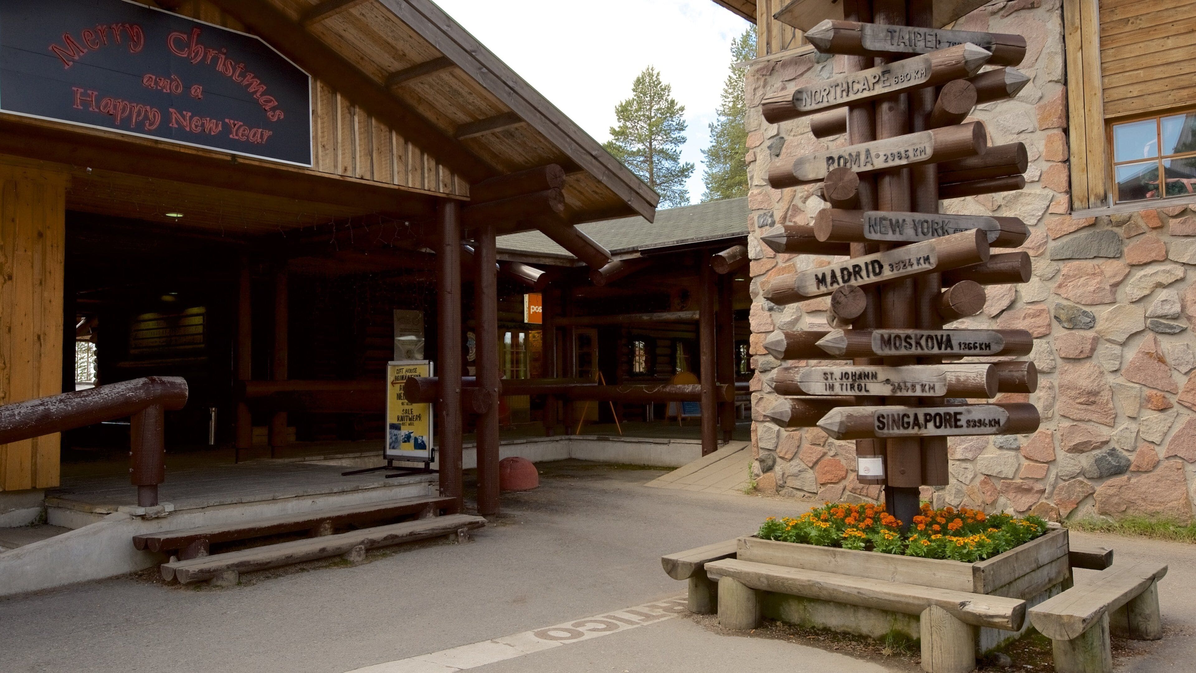 Rovaniemi which includes a small town or village, signage and a square or plaza