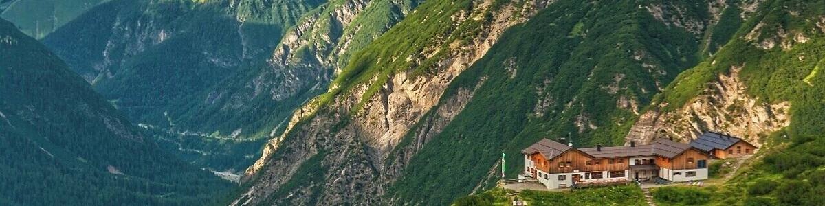 July 2015
Hanauer Huette, Lechtaler Alps, Tyrolia, Austria
Hanauer Huette (1.922 m alt.) as seen from the valley under Dremelspitze on trail from Gramais over Kogelseescharte to Hanauer Huette. They knew where to place the huts to get great views :)