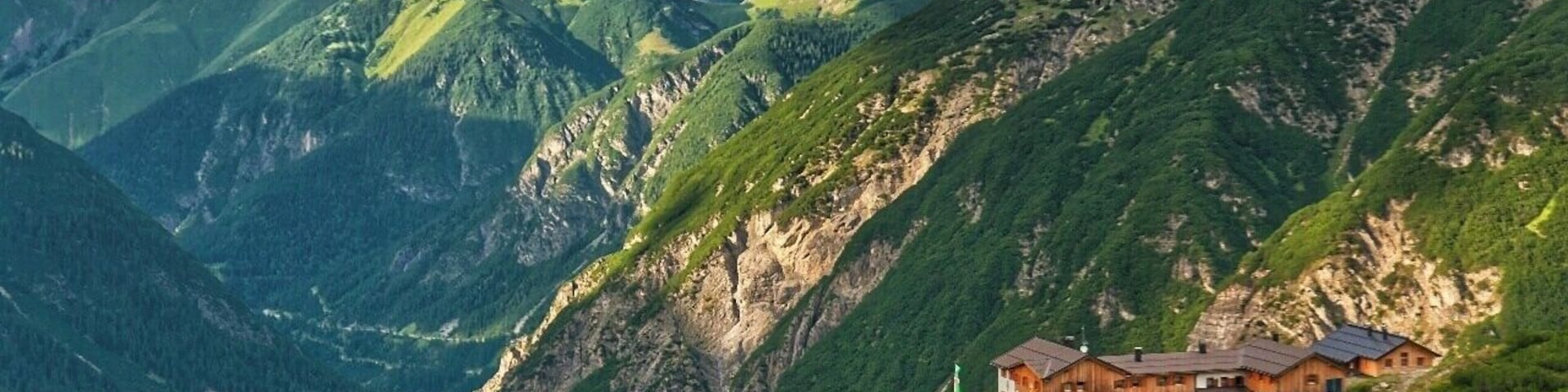 July 2015
Hanauer Huette, Lechtaler Alps, Tyrolia, Austria
Hanauer Huette (1.922 m alt.) as seen from the valley under Dremelspitze on trail from Gramais over Kogelseescharte to Hanauer Huette. They knew where to place the huts to get great views :)