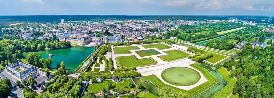 Aerial view of Chateau de Fontainebleau with its gardens, a UNESCO World Heritage Site in France