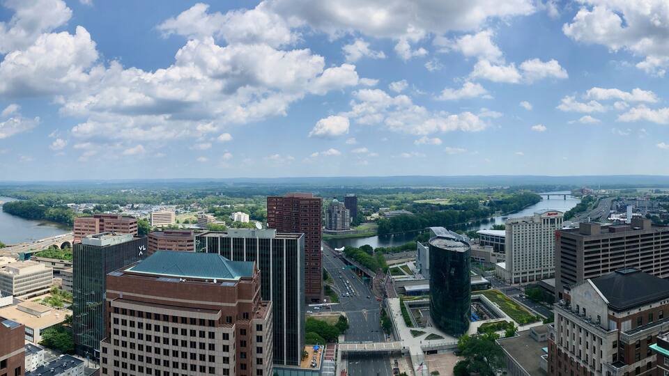 Arial view of a city river highway office buildings. Taken in Hartford Connecticut