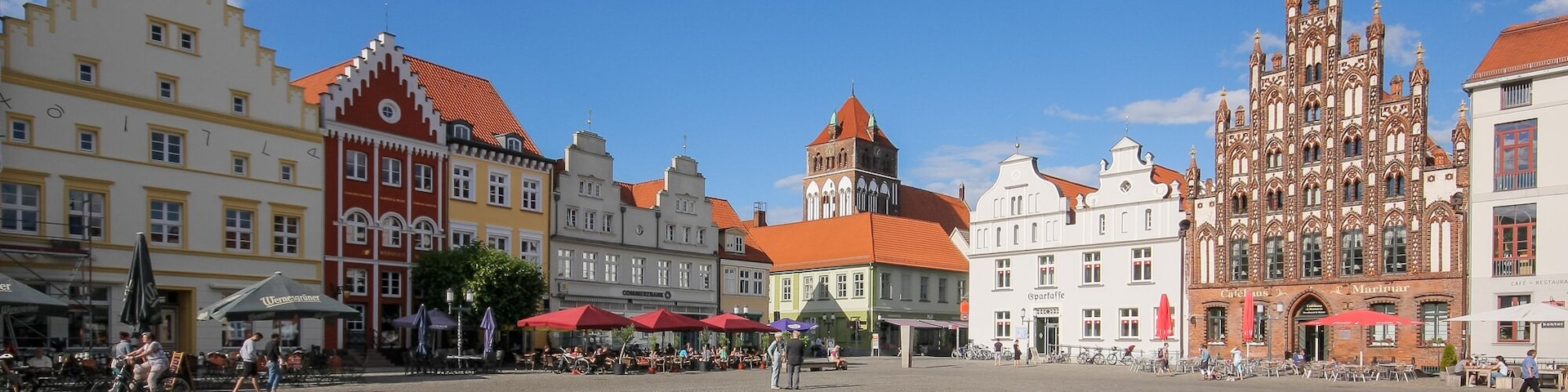 Northeastern of Greifswalds market place, Mecklenburg-Vorpommern, Germany. With the church St. Marien in the background