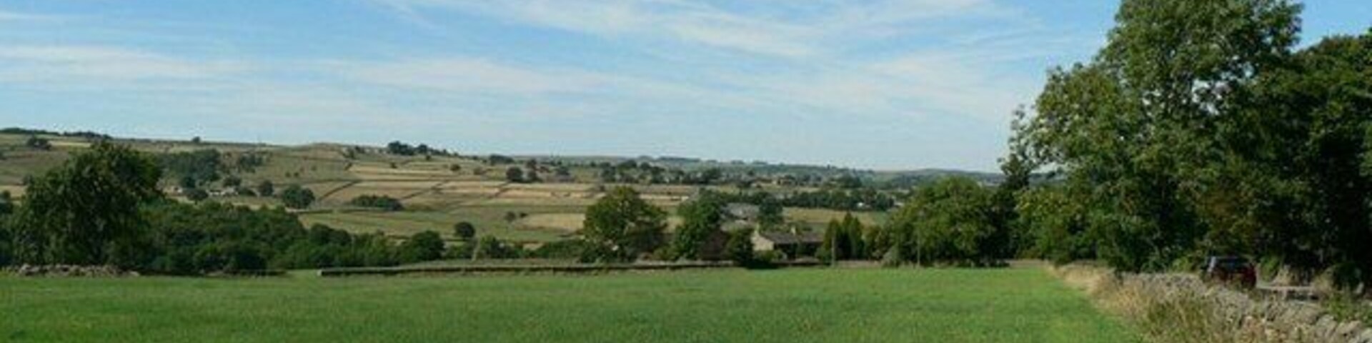 The Carr from Low Lane, Darley. The road at the right is Darley Carr. The village of Darley is hidden in the valley bottom.