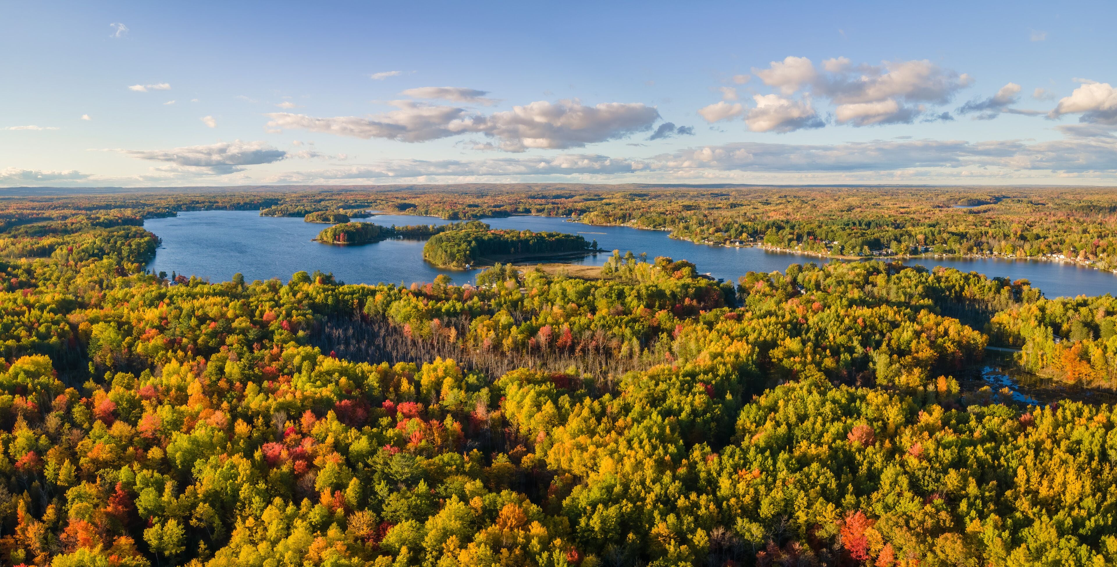 Beautiful evening autumn colors at Sage Lake in Central Michigan countryside	