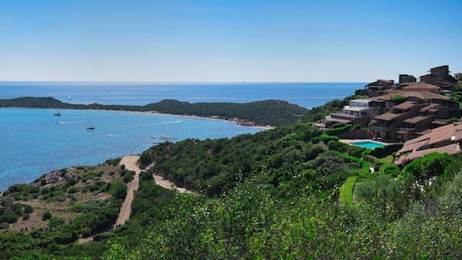 Panorama of the bay "Capo Coda Cavallo" Sardinia (Italy) on a summer day with blue sky.