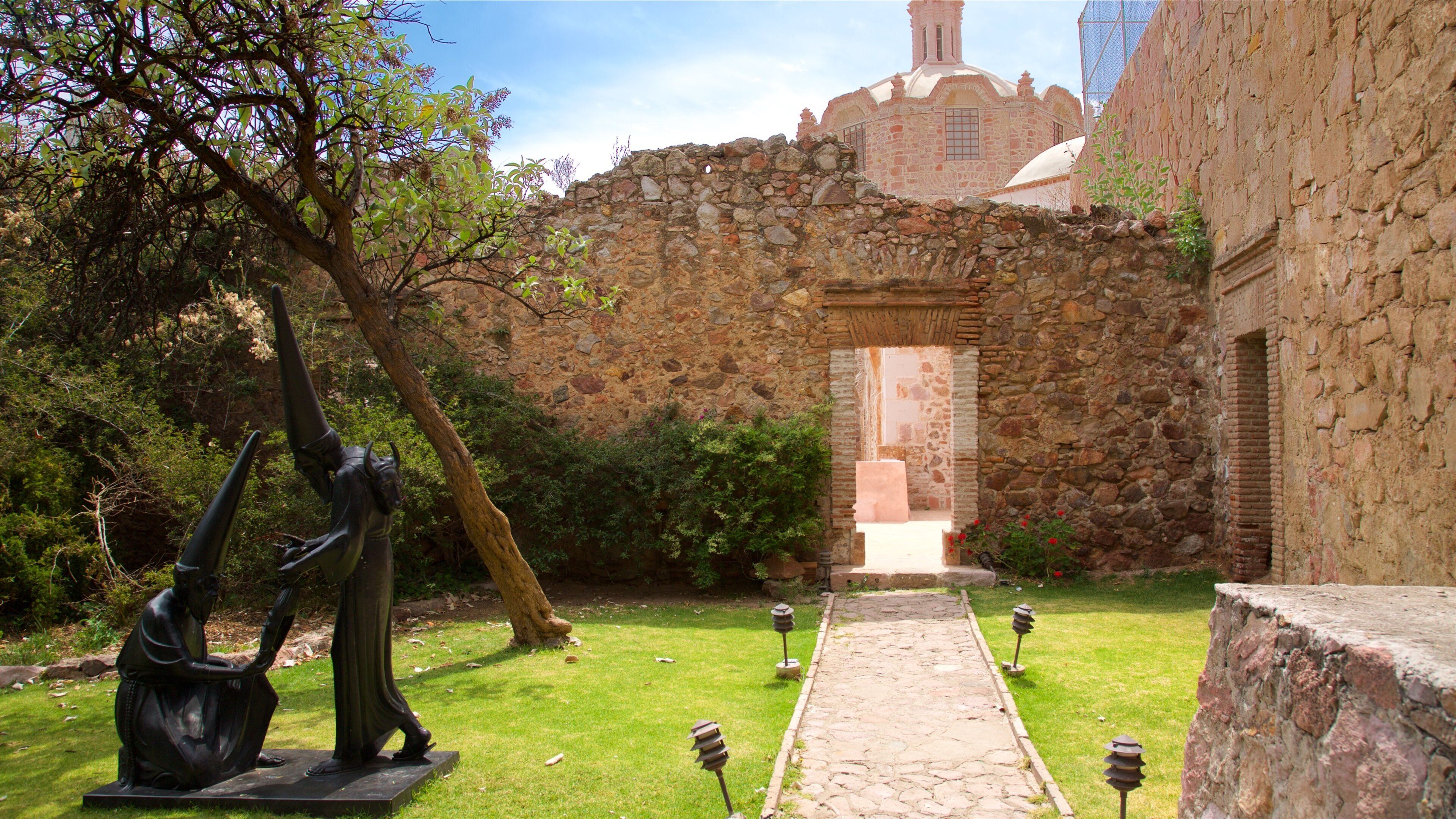 Historic Center featuring heritage elements, a garden and outdoor art