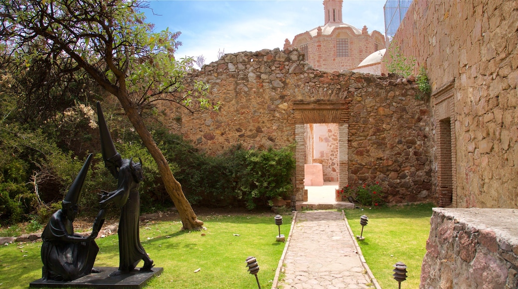 Historic Center featuring heritage elements, a garden and outdoor art