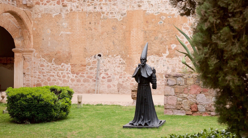 Historic Center featuring a statue or sculpture and a park