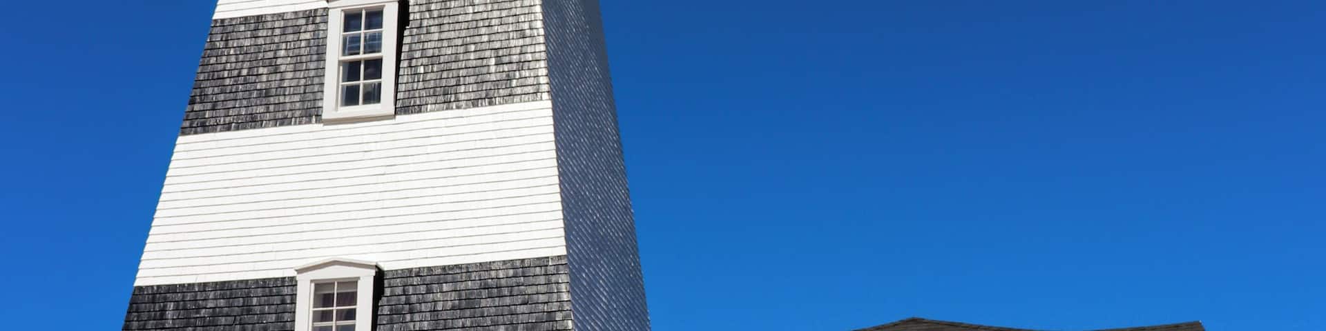 West Point Lighthouse was the second lighthouse I visited while on the island. This lighthouse is unique from the others as it's considered a second generation of lighthouses due to its shape. You will also notice that the lines are painted black instead of red like other houses. This was done because the lighthouse was difficult to see due to its reflection off the red sandy beaches or how the sun reflected off the building. This made it easier for sailors to spot it during bright conditions. There is a small fee to visit the lighthouse, and you can go right to the top to view it actually working. So many lighthouses I've been to are no longer active so this was a treat to see.