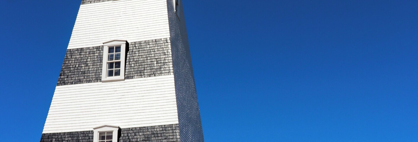 West Point Lighthouse was the second lighthouse I visited while on the island. This lighthouse is unique from the others as it's considered a second generation of lighthouses due to its shape. You will also notice that the lines are painted black instead of red like other houses. This was done because the lighthouse was difficult to see due to its reflection off the red sandy beaches or how the sun reflected off the building. This made it easier for sailors to spot it during bright conditions. There is a small fee to visit the lighthouse, and you can go right to the top to view it actually working. So many lighthouses I've been to are no longer active so this was a treat to see.
