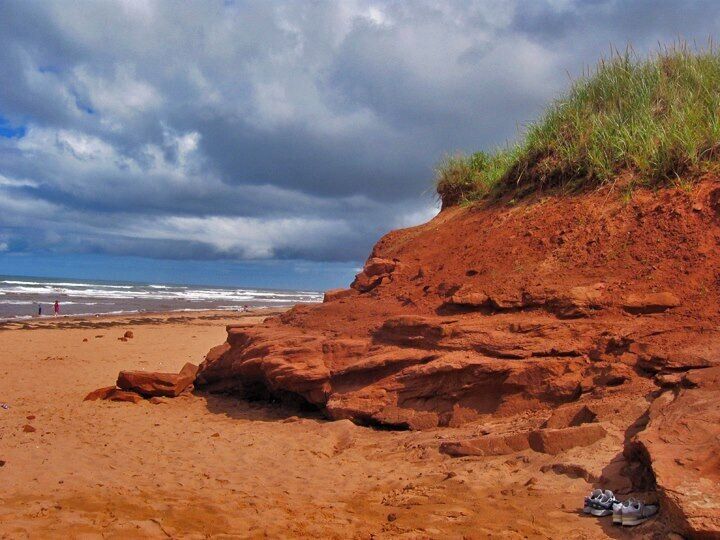 Scenic beach with the red sandstone cliffs that typify PEI. #beach