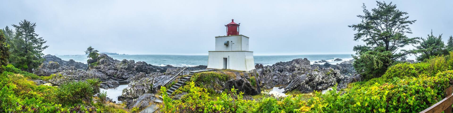 Amphitrite point lighthouse guiding ships near ucluelet on vancouver island