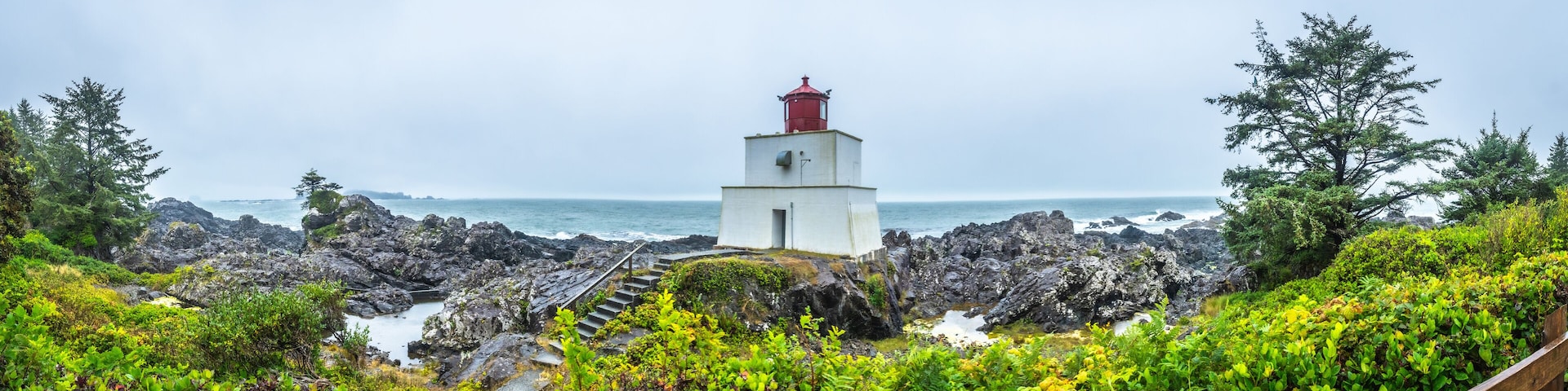 Amphitrite point lighthouse guiding ships near ucluelet on vancouver island