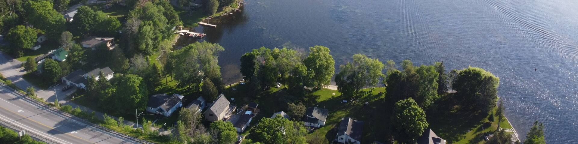 Aerial View of Beautiful Canadian Outdoor Landscape in Kawartha Lakes, Ontario during Clear Summer Weather