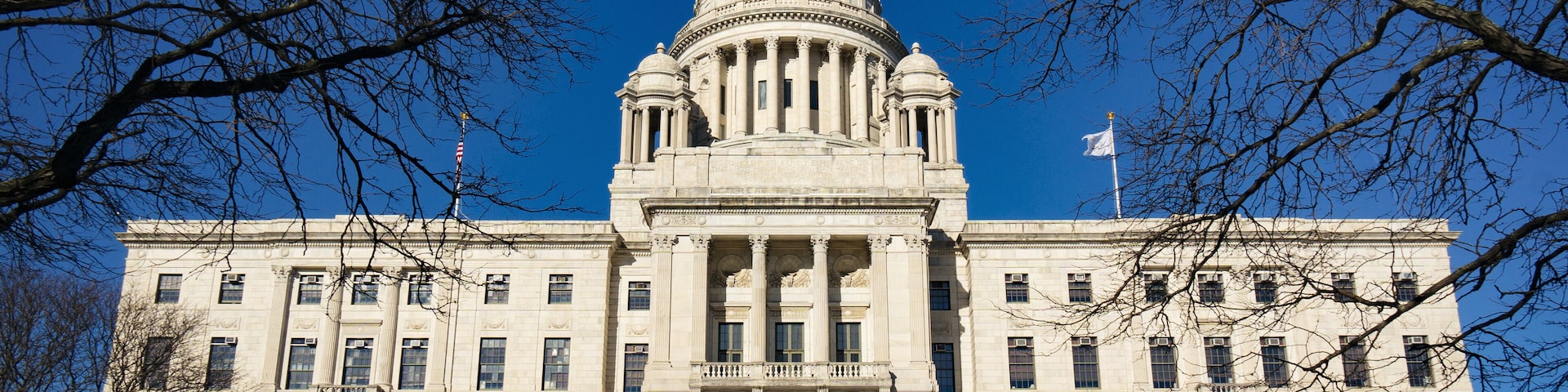 The Rhode Island State House is the capitol of the U.S. state of Rhode Island. It is located on the border of the Downtown and Smith Hill sections of the state capital city of Providence.; Shutterstoc