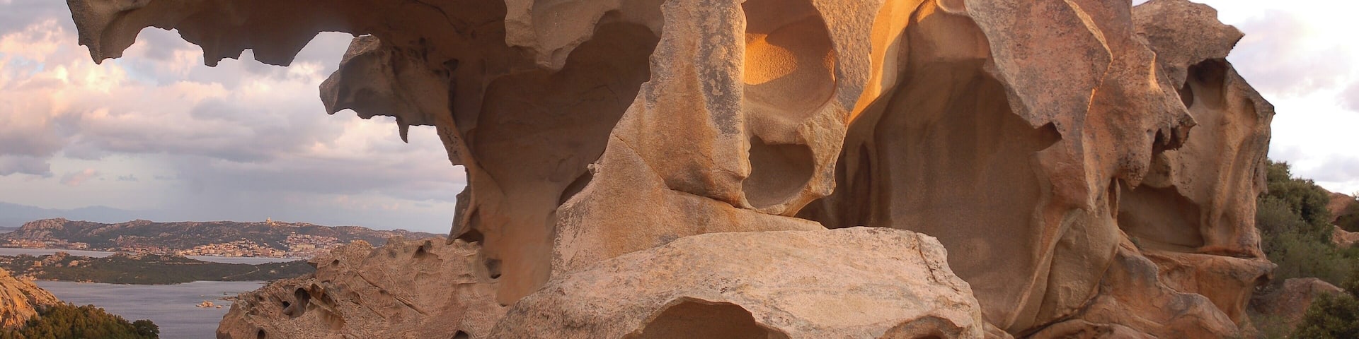 Translated into English as Cape of the Bear, this significant outcrop of rock eroded by the wind is a tourist attraction on Sardinia, an island so different from Sicily or the mainland. Its influences have been from different places than elsewhere so you'll find the Renaissance missing here and more accent on natural features. A great place for hiking.